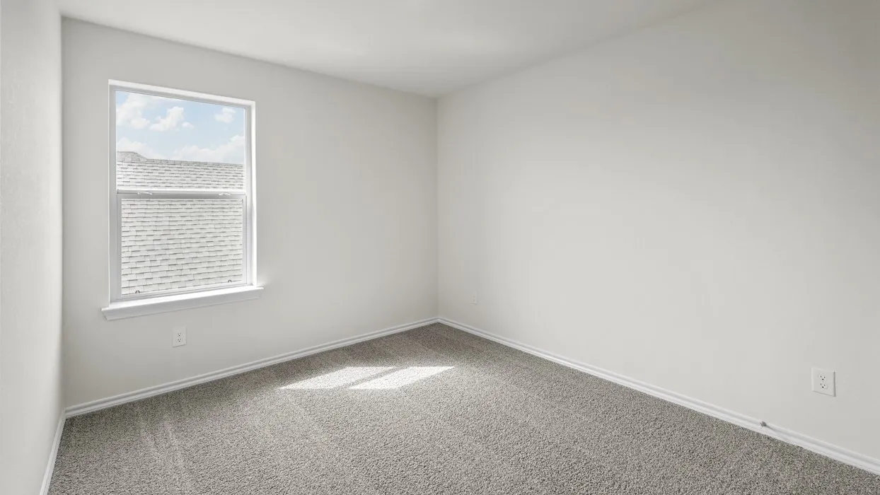 Bright room featuring a single window, light gray carpet, white walls, and white baseboards