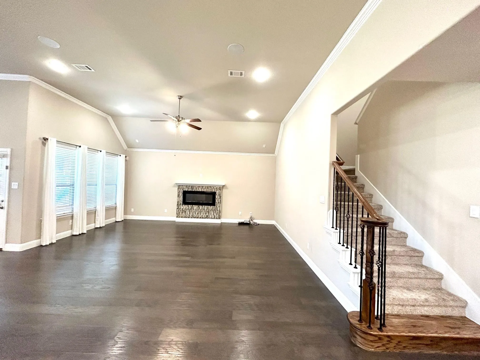 View of the living area.  Stairs lead up to a huge gameroom/excercise/media room.