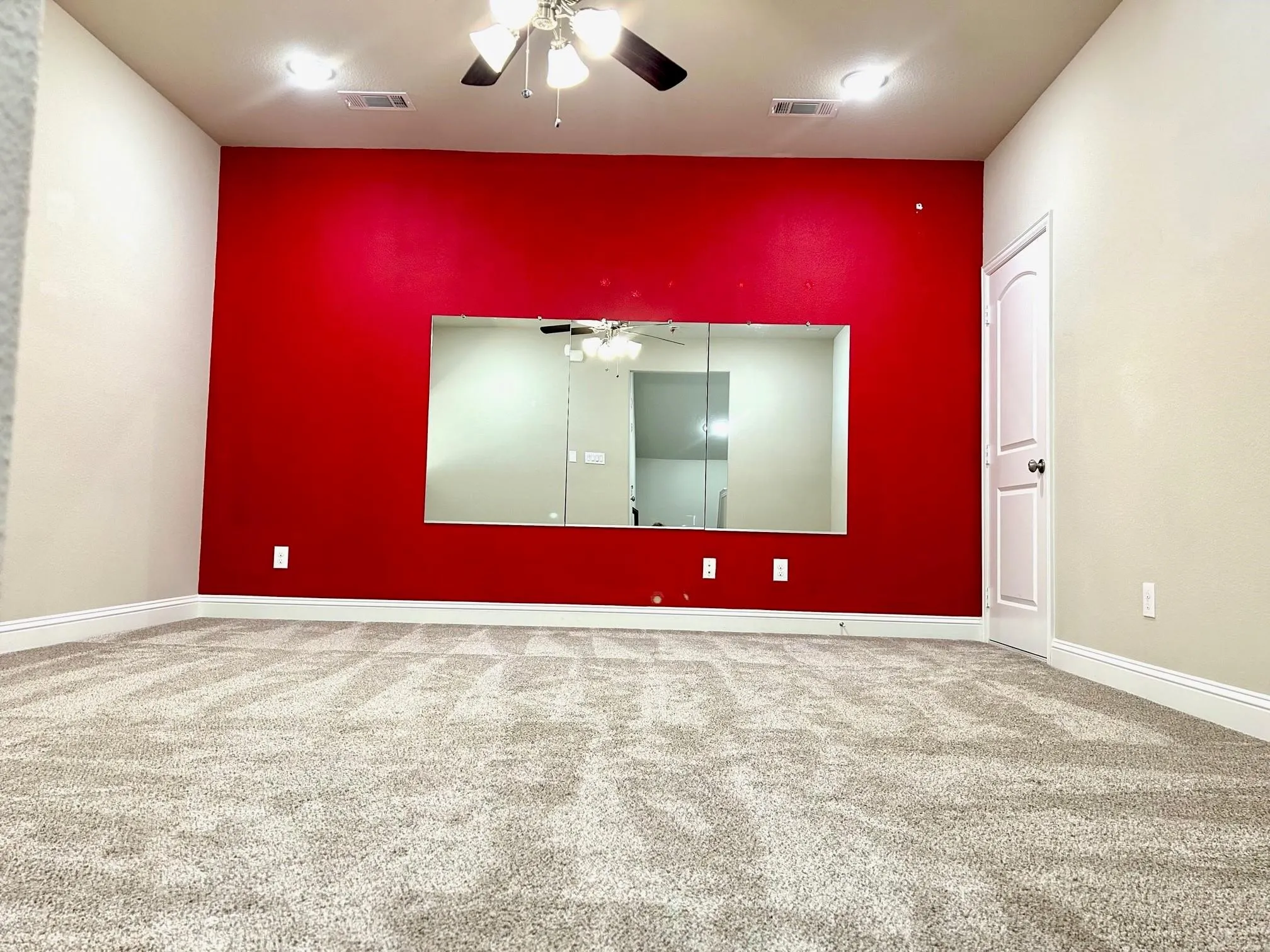 The only room upstairs and can be used as a gameroom/exercise/media room or can also be used as a storage area.