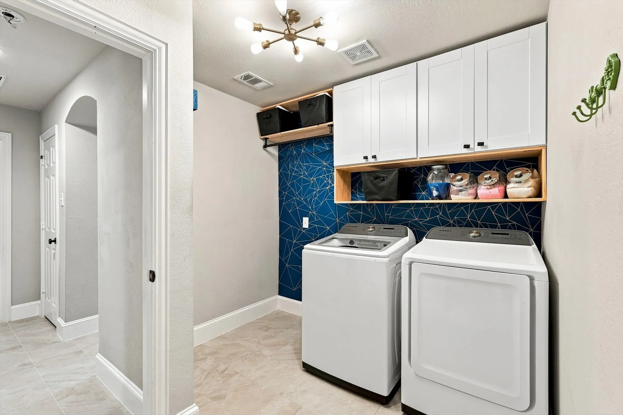 Plenty of room for a fridge or freezer and the washer and dryer are included!