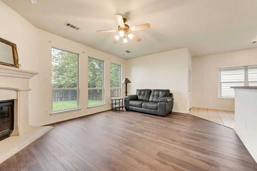 Large sized living room with fireplace