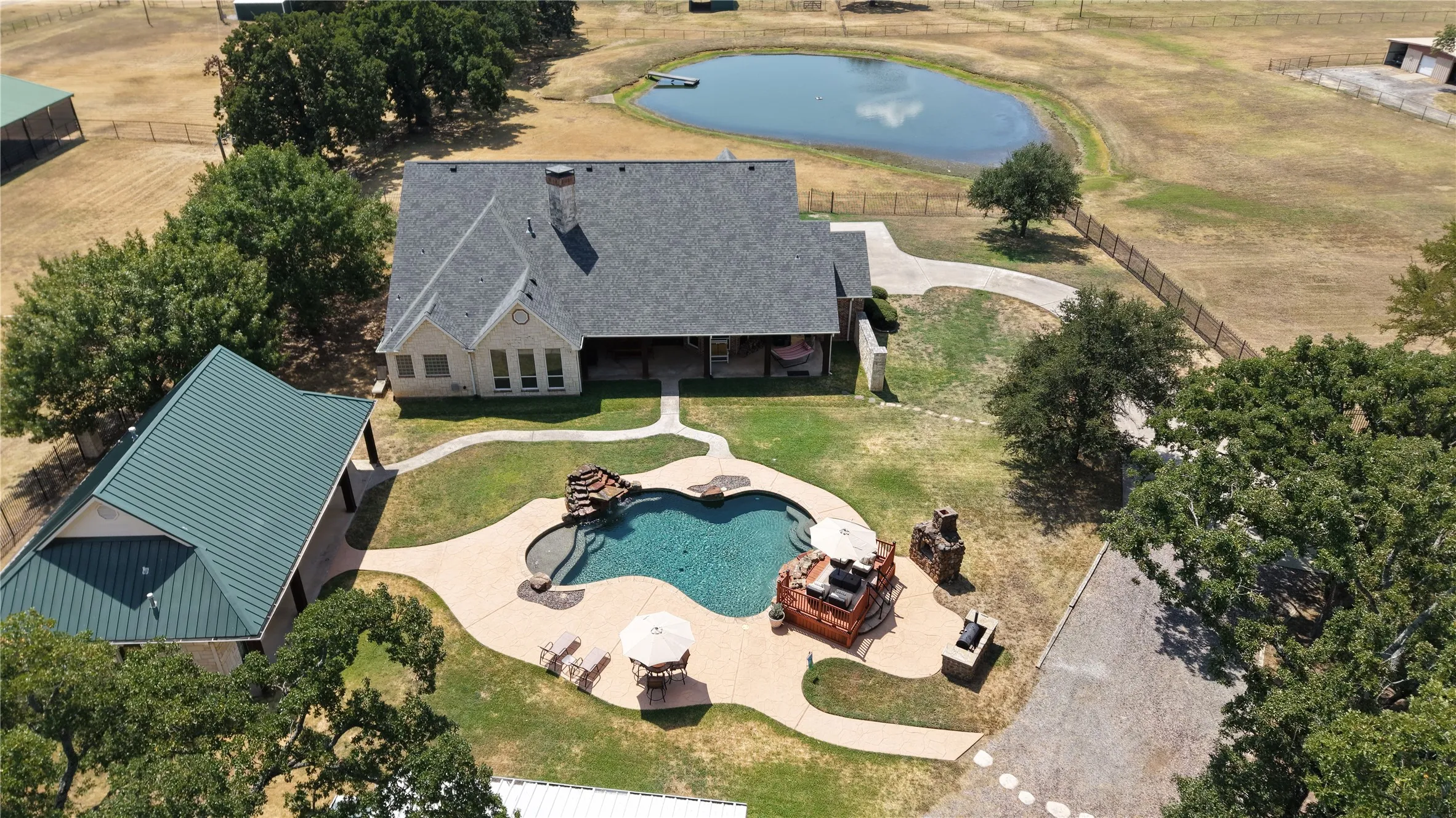 Main House, Pool House, Garage, pool and one of two ponds