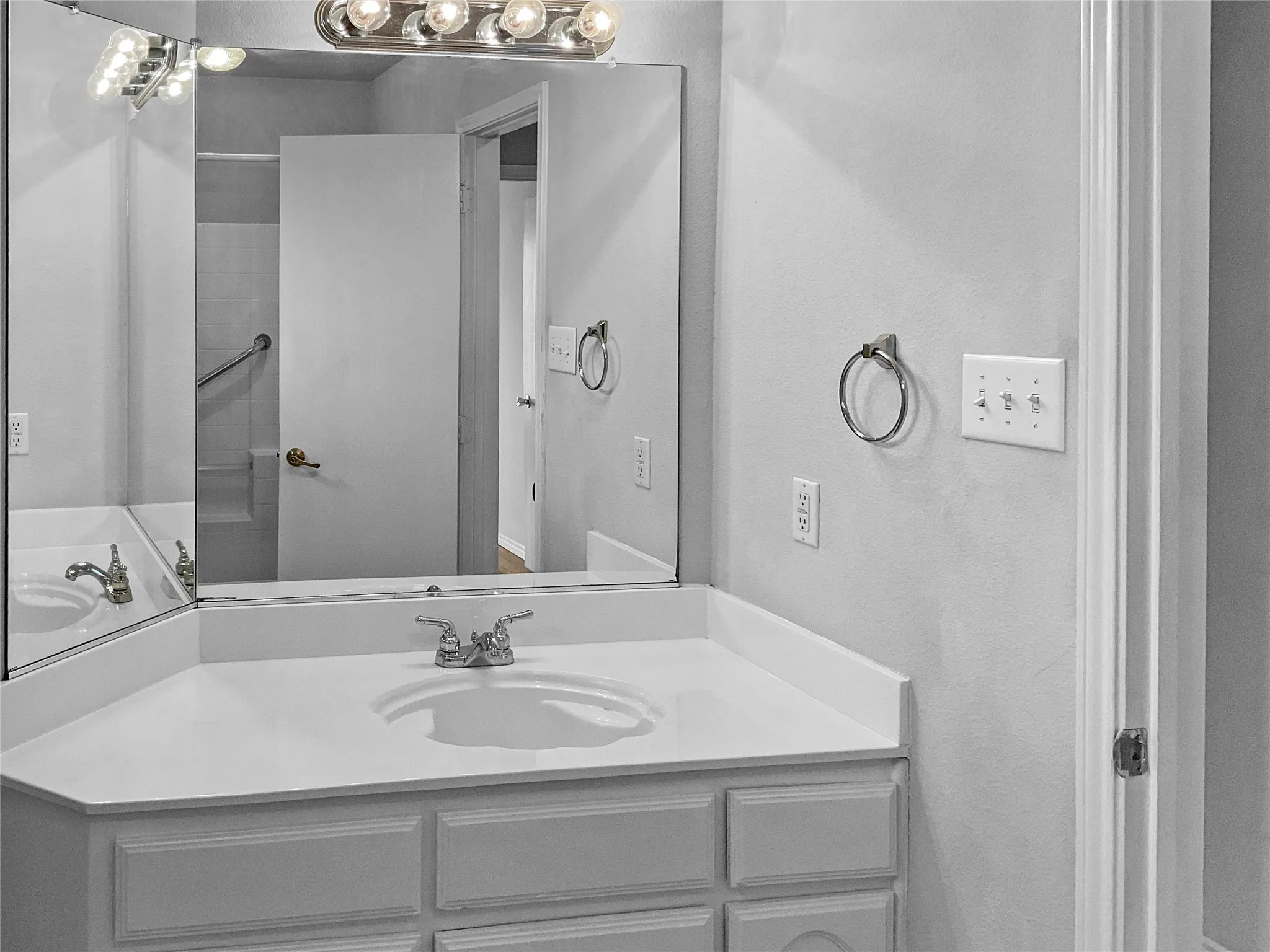 Bathroom featuring large vanity