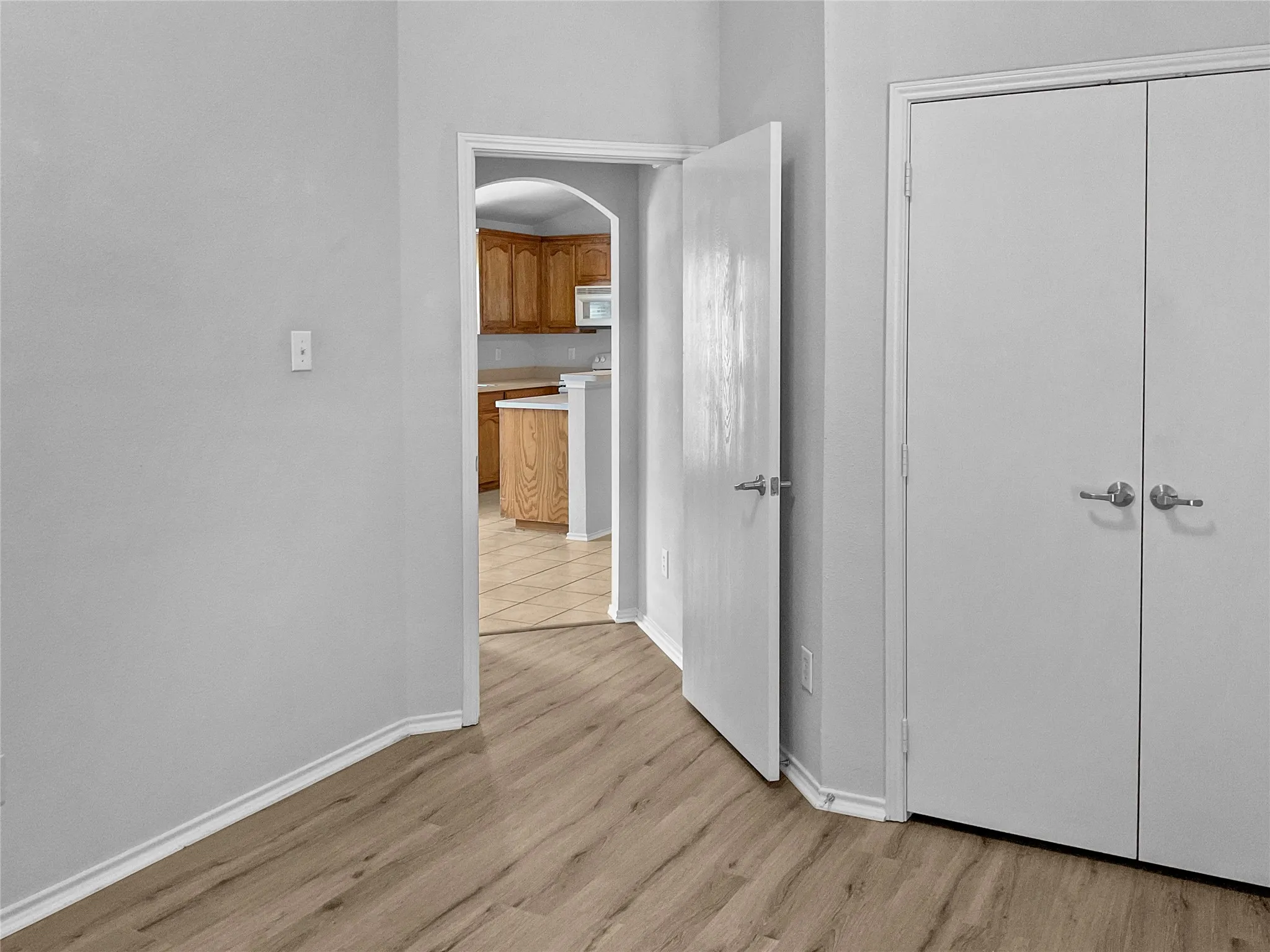 Hall with light wood-type flooring