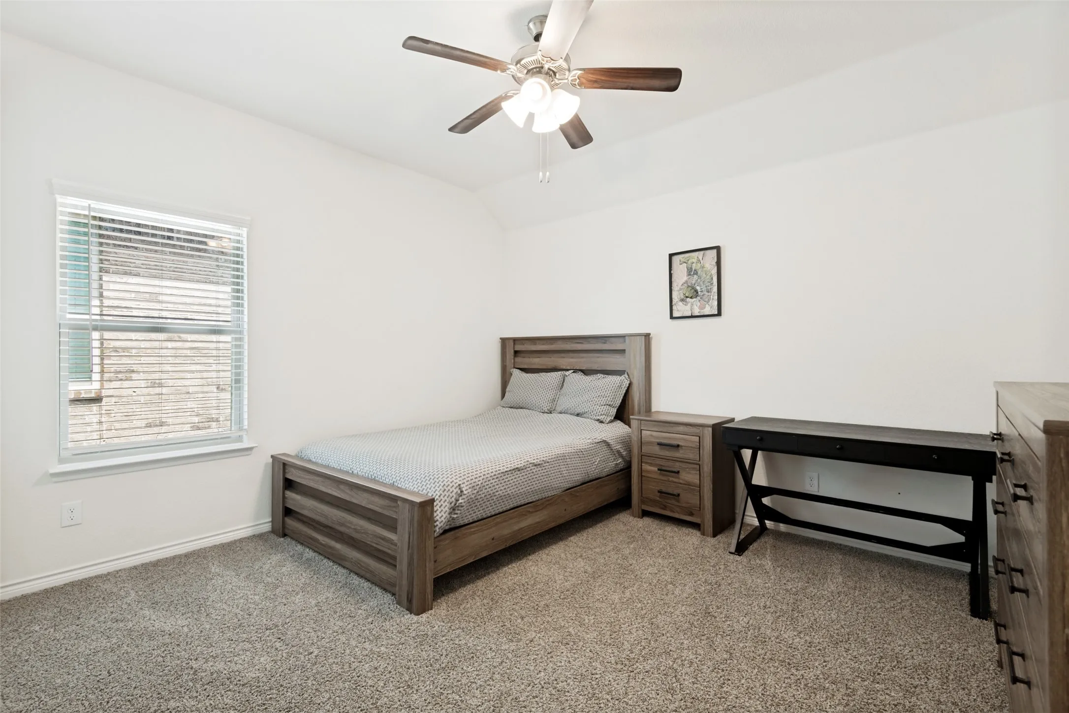 Spacious first-floor primary suite offering comfort, privacy and convenience.