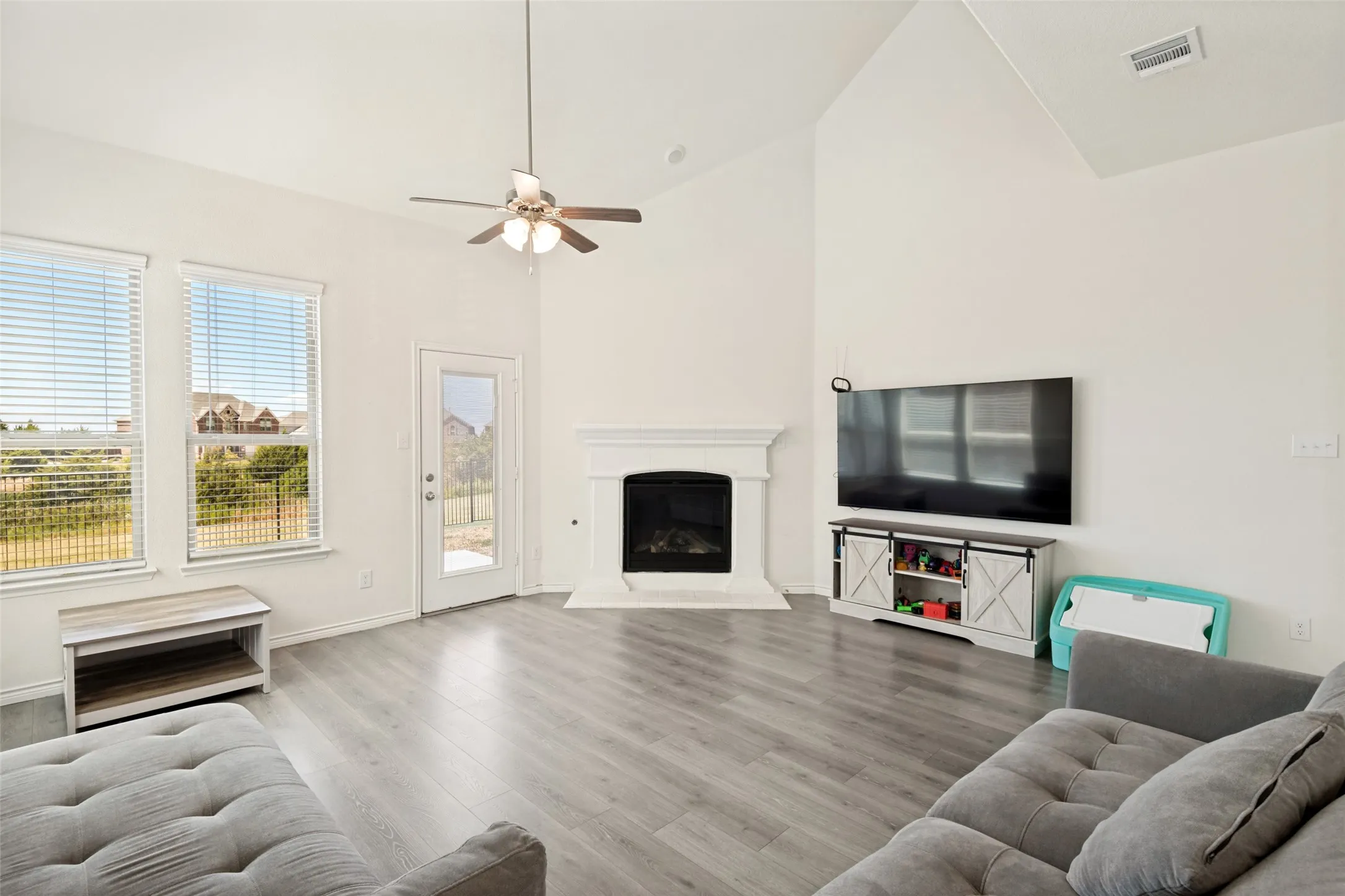 Cozy living area centered around the gas fireplace, creating a warm and inviting focal point