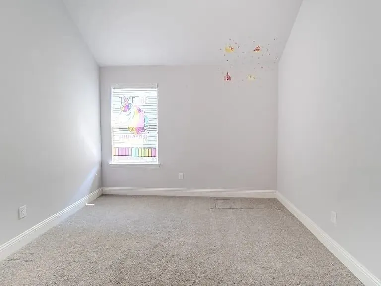 Neutral paint colors with wall-to-wall carpeting and white trim