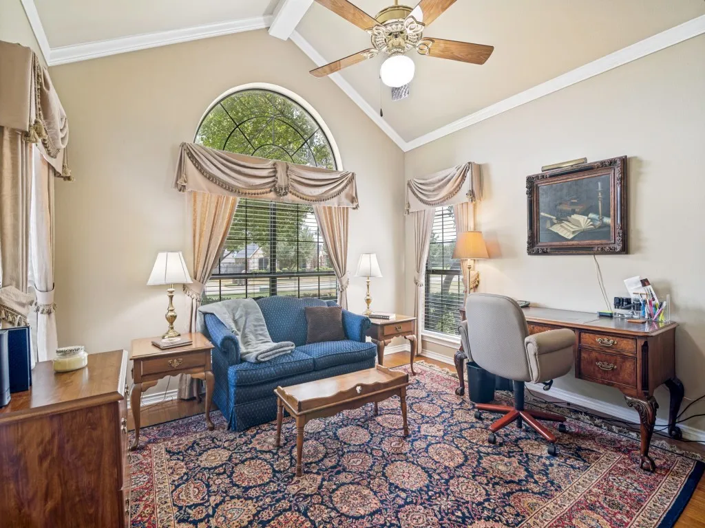 Currently used as an office, this room has a vaulted ceiling and closet.