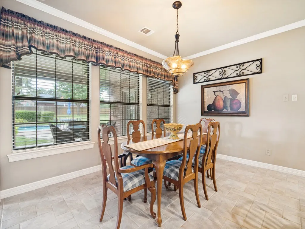 Spacious breakfast area with views of the back yard.