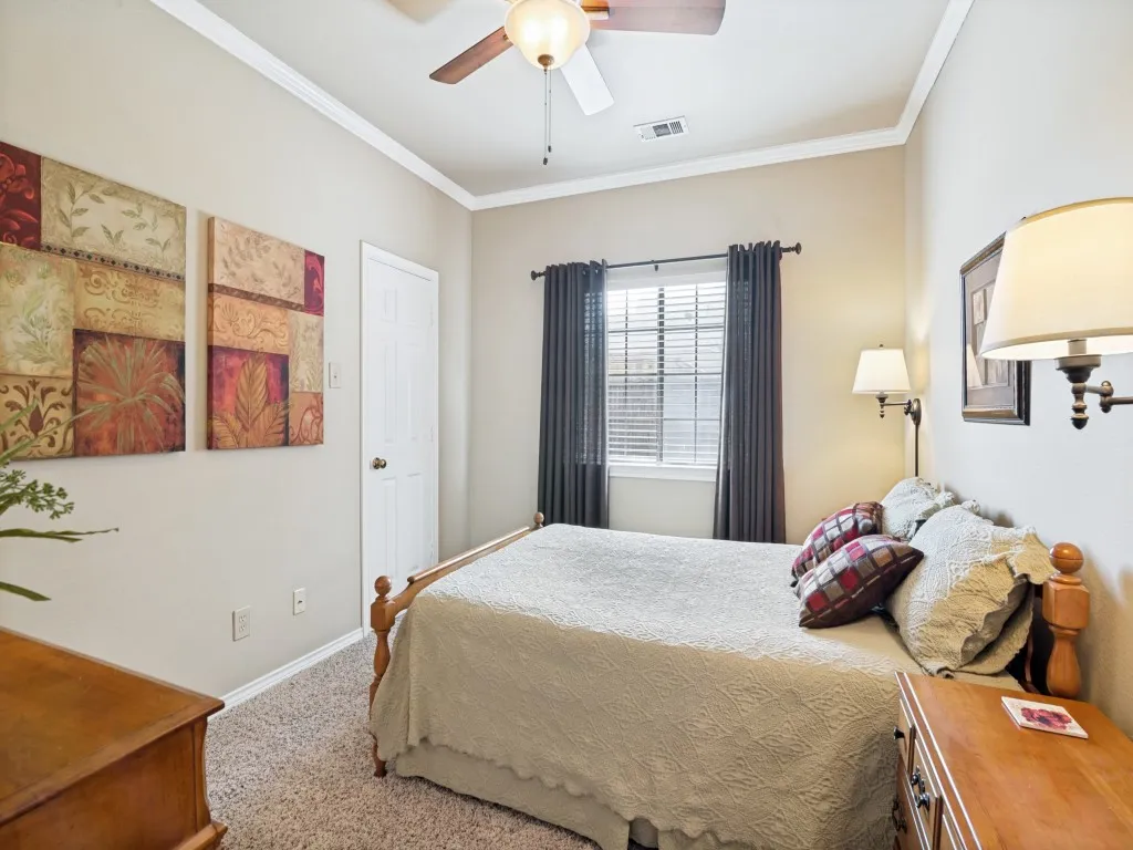 Secondary bedroom with large walk-in closet.