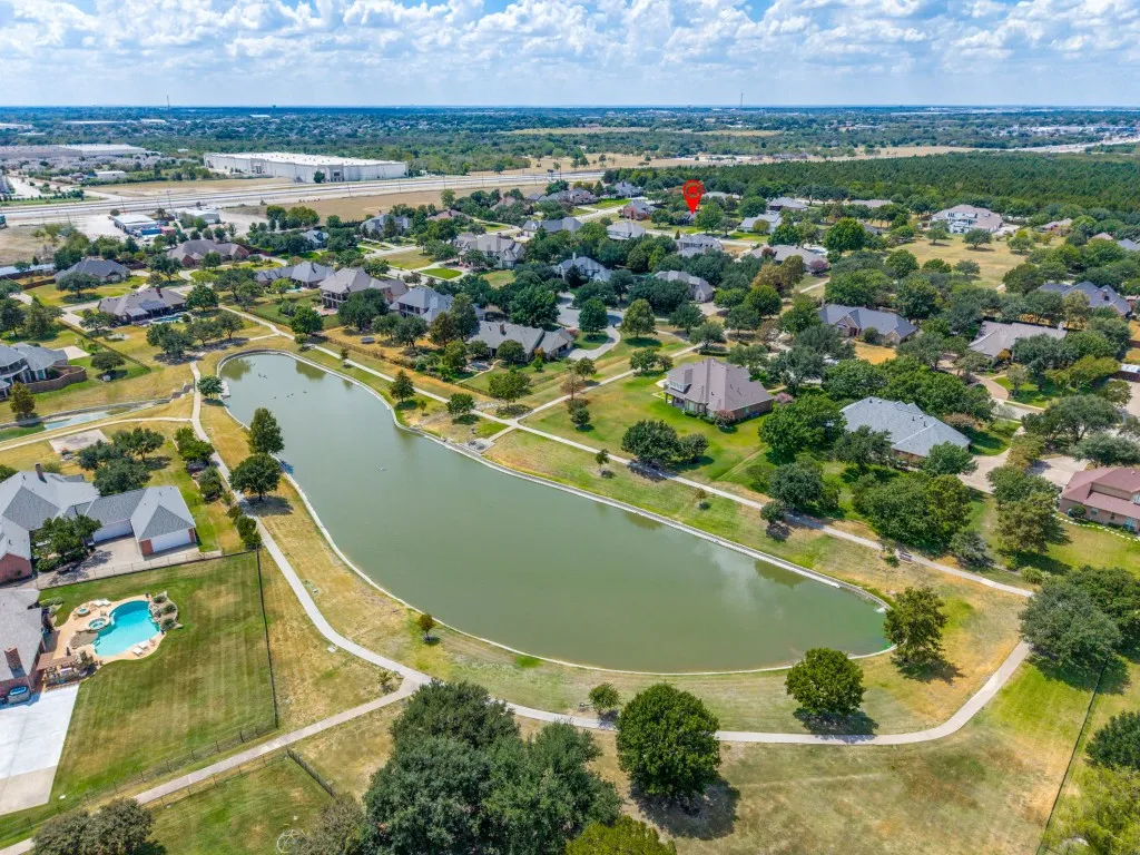 View of the lake in this subdivision with walking trails and catch and release fishing.  Ducks, geese, and turtles  abound!