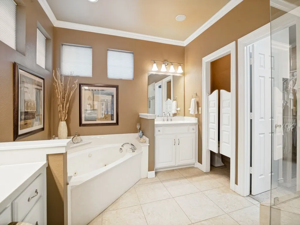 The primary bath also has a jetted tub and large walk-in closet.