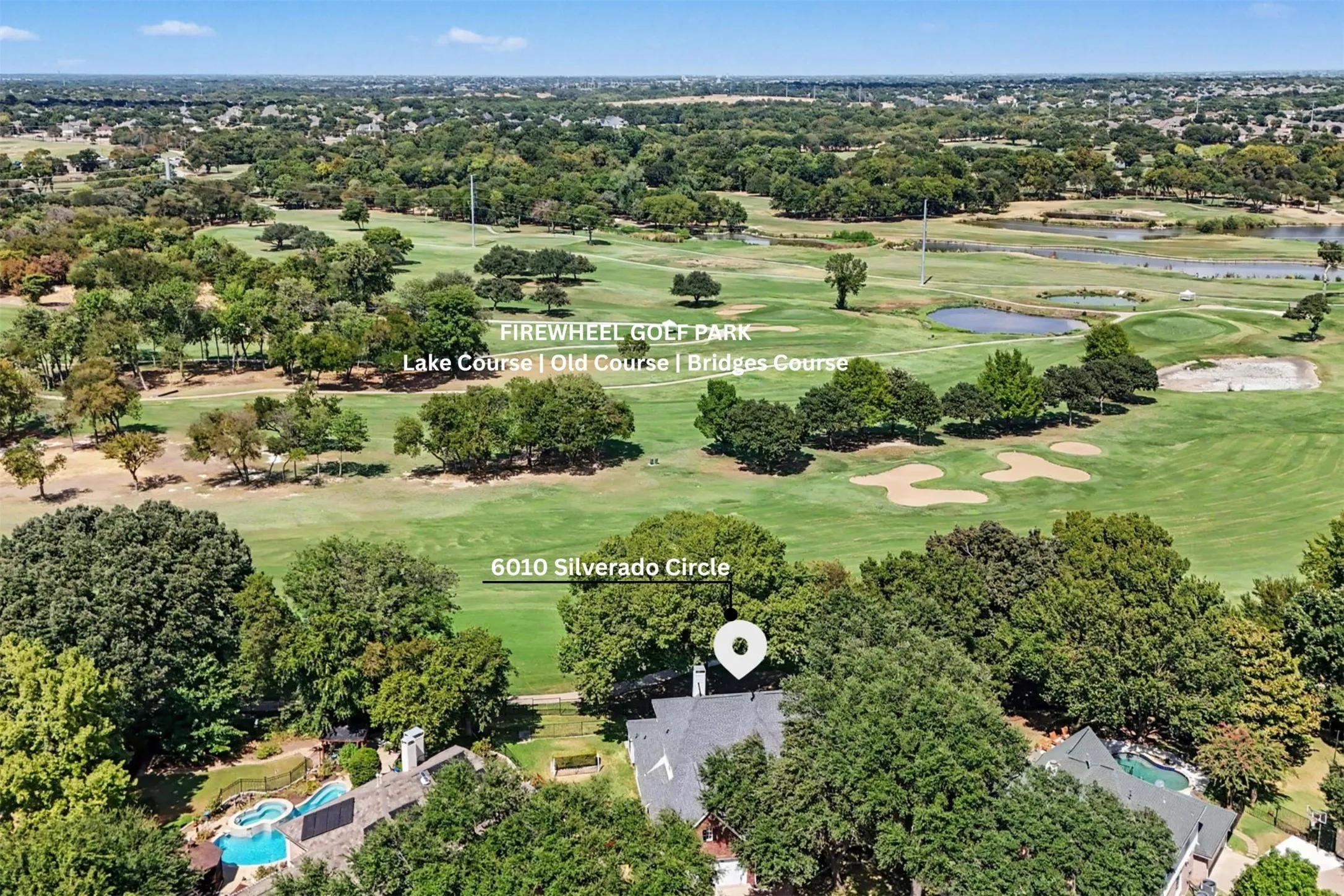 Aerial showcasing unobstructed golf course views. 6010 Silverado Circle sits near the 3rd whole of the Old course.  Firewheel Golf Park has three golf courses.