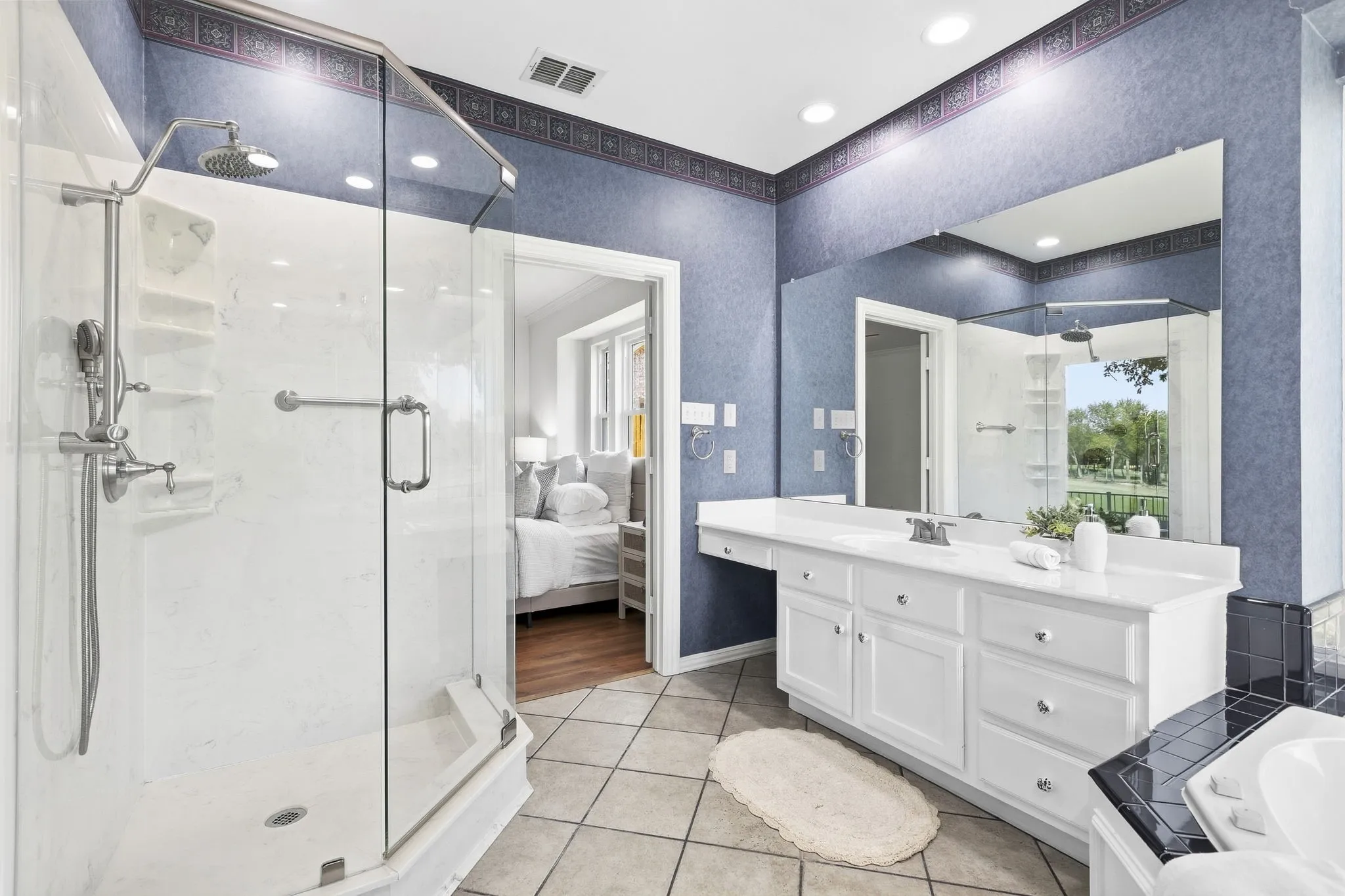 Glass-enclosed shower
