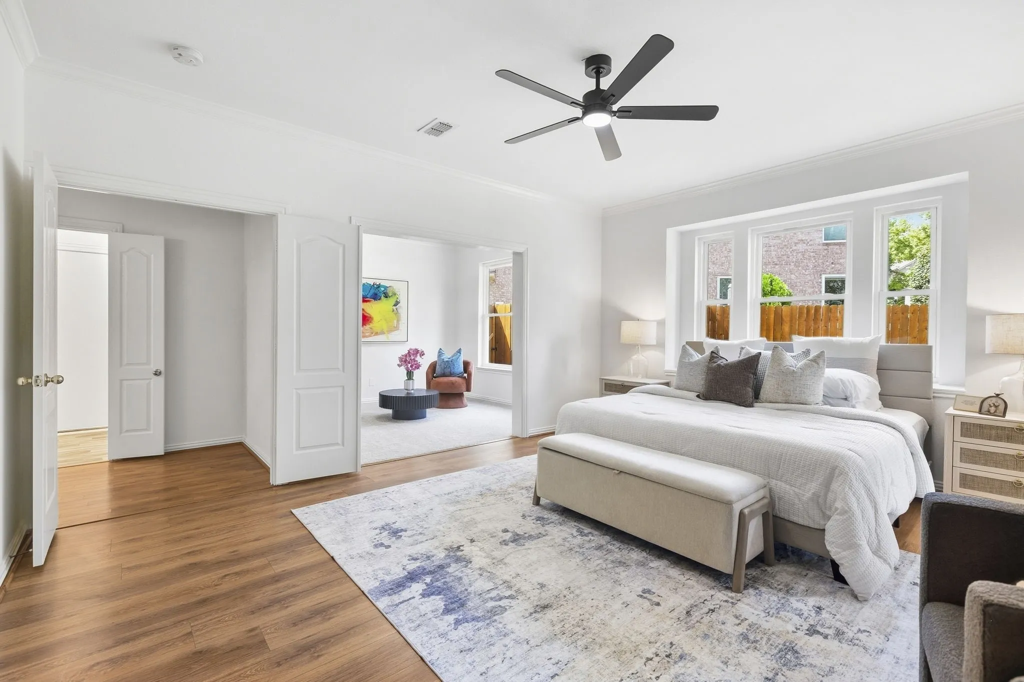 1st floor Primary Bedroom: Wood type finish flooring, Alabaster painted walls and ceilings with a large study off to the left of this photo