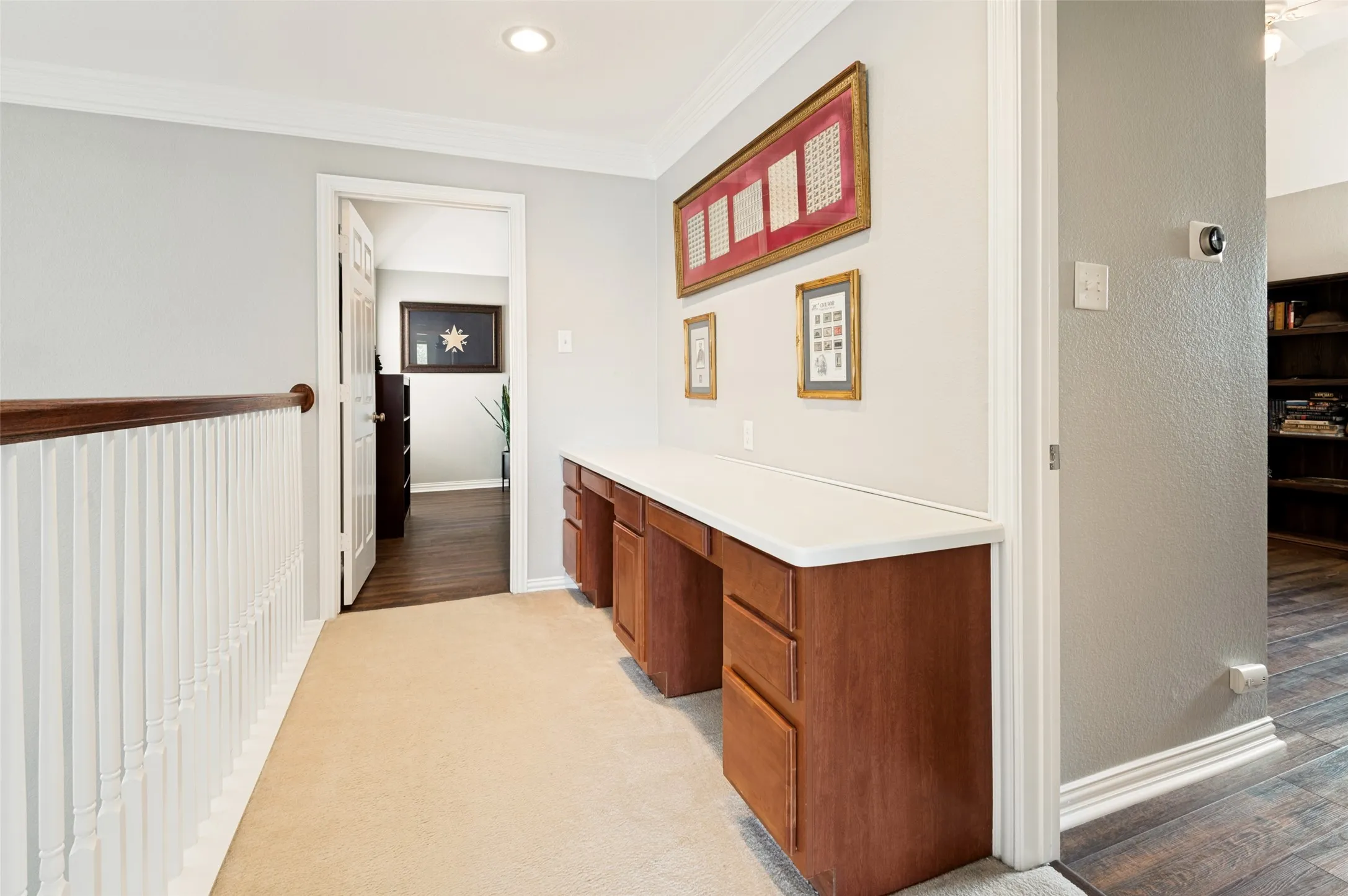 Loft featuring built-in double desks.
