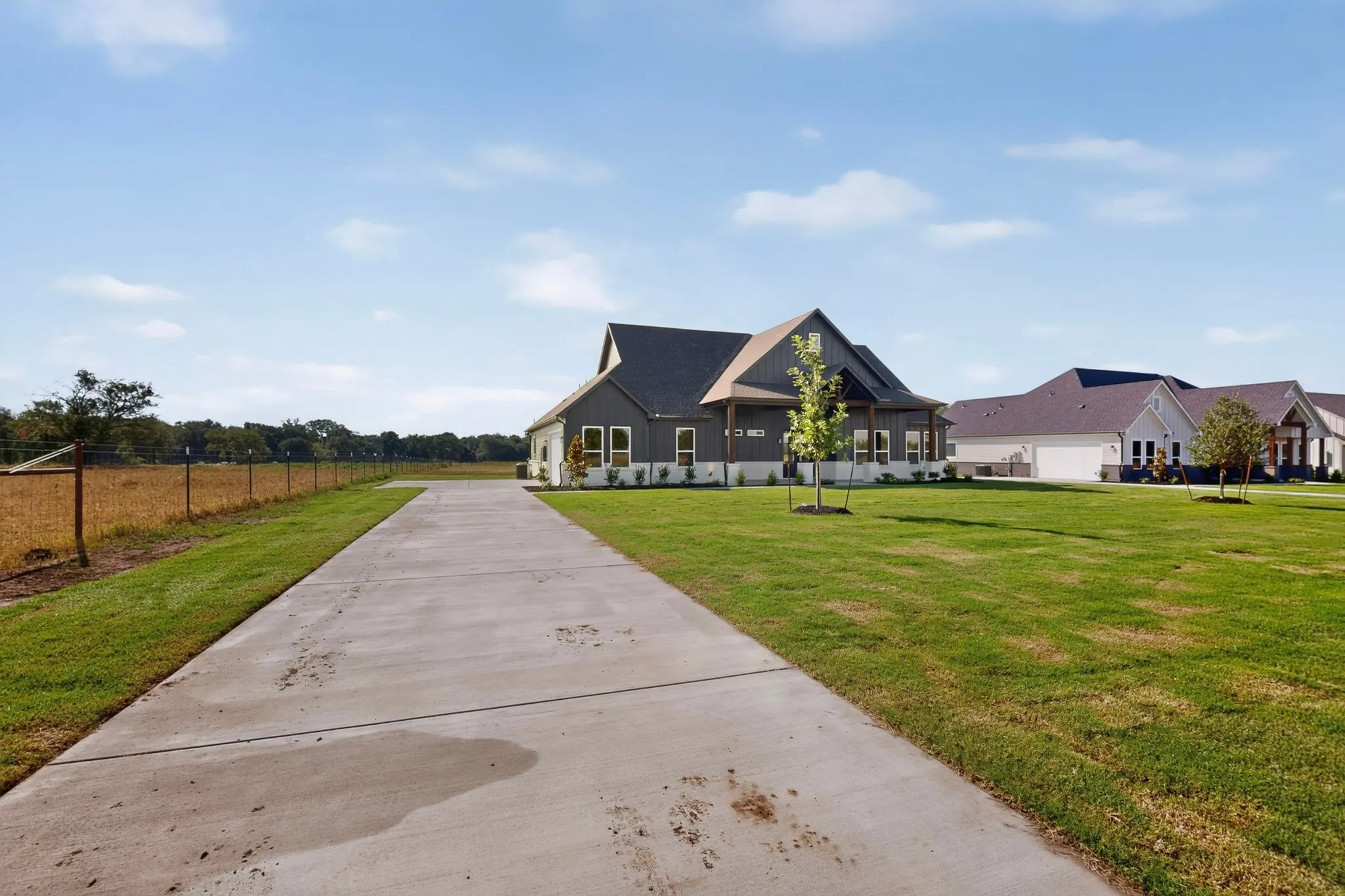Contemporary dark gray siding with white trim
