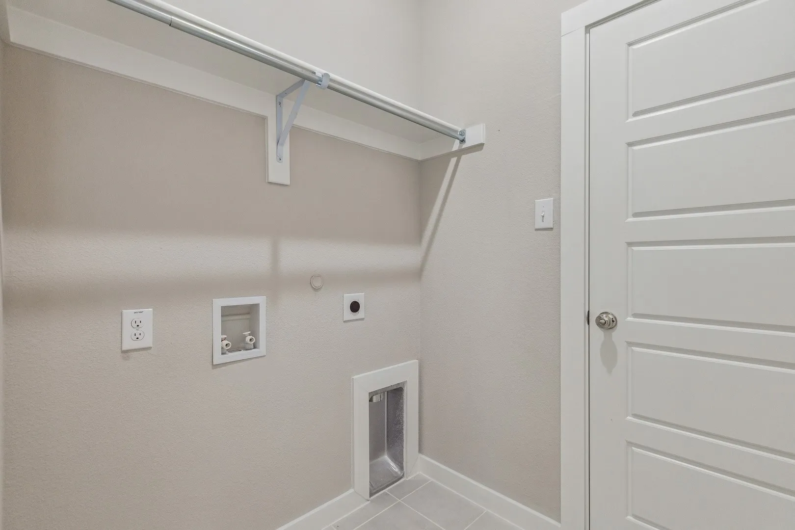 Utility Room in the Birch home plan by Trophy Signature Homes – REPRESENTATIVE PHOTO