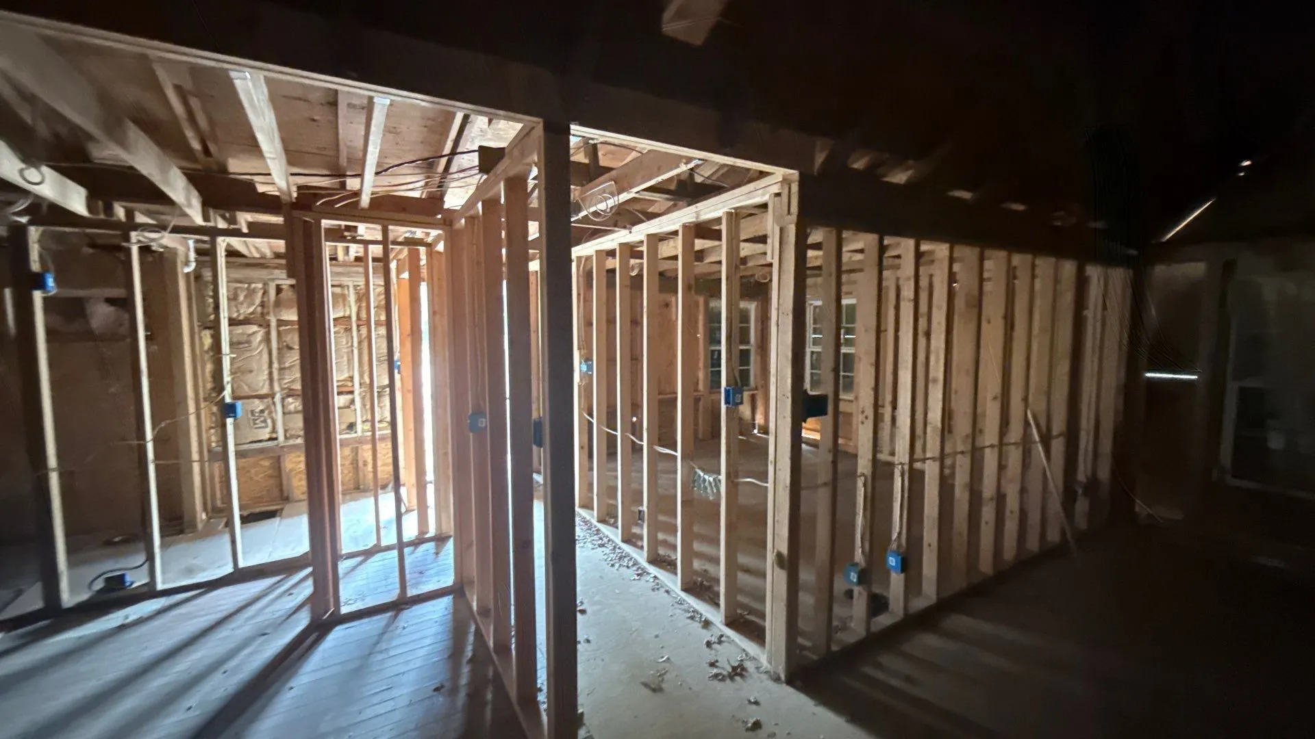 Exposed wood framing with visible structural beams