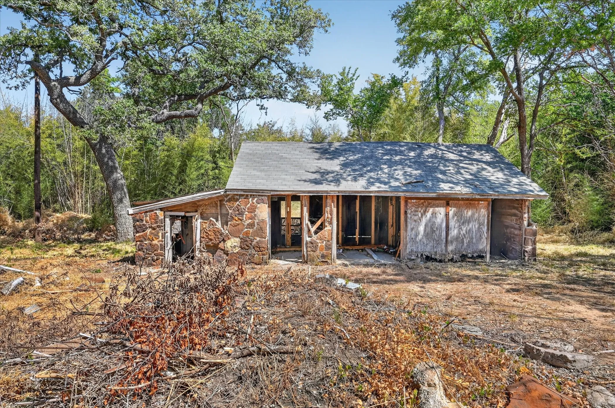 Stone-faced exterior with a gabled roof