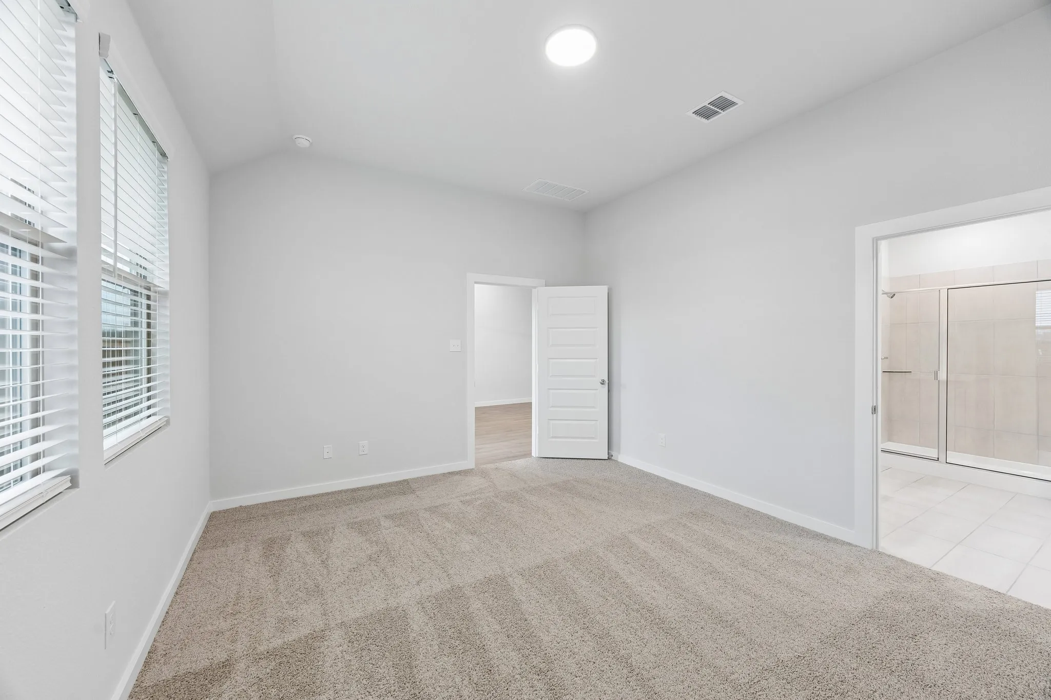 Primary Suite in the Cedar home plan by Trophy Signature Homes – REPRESENTATIVE PHOTO