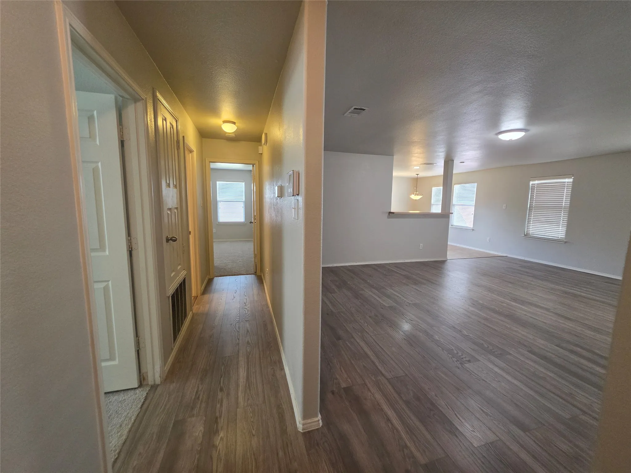 Hall view to bedrooms and 2ndry bathroom