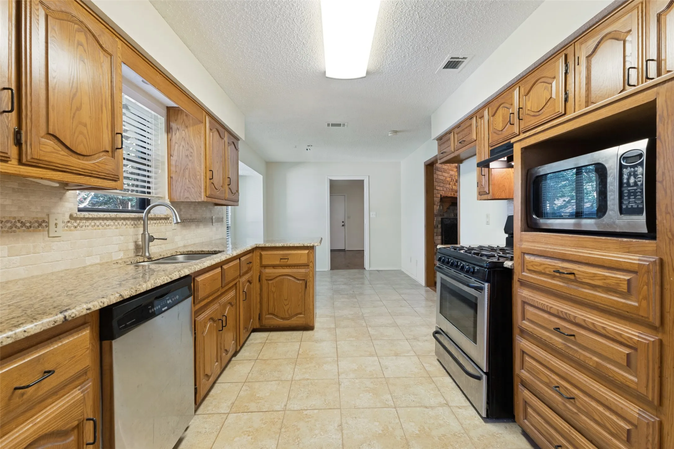 Lots of storage, granite counters and a nice area to eat in addition to the dining room.