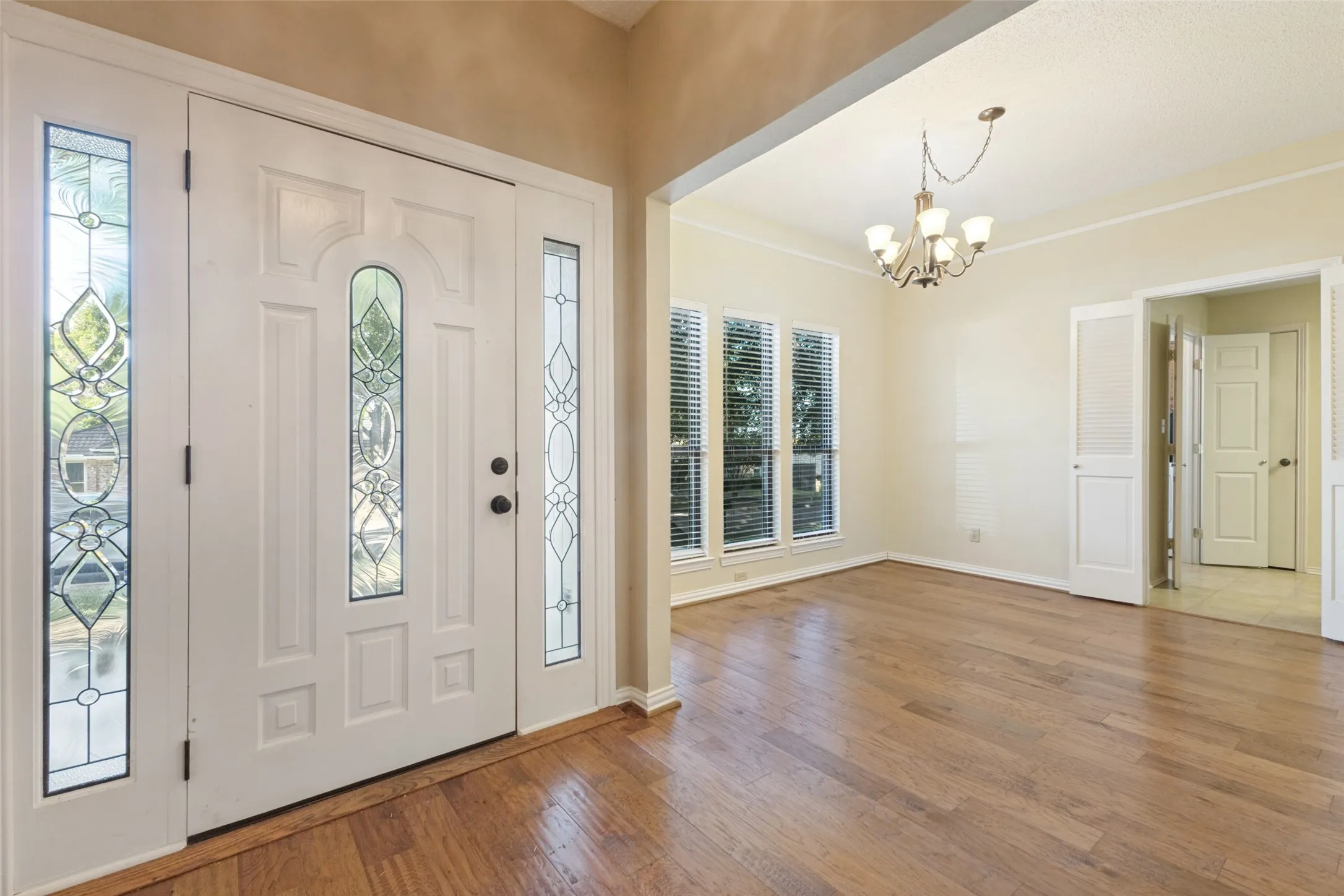 Foyer and view into the dining room.
