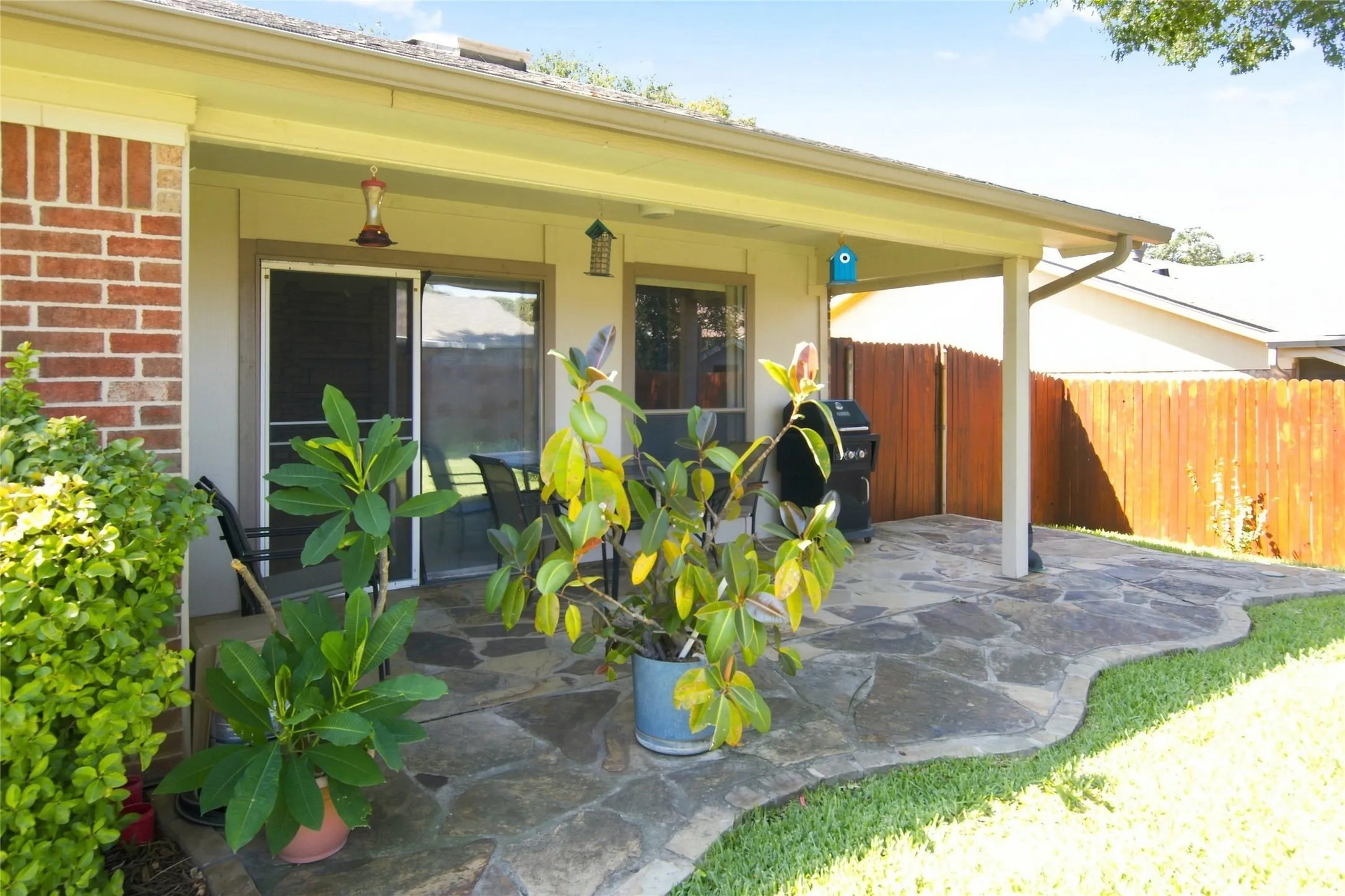 . Step outside onto the extended covered patio and imagine lingering over your morning coffee