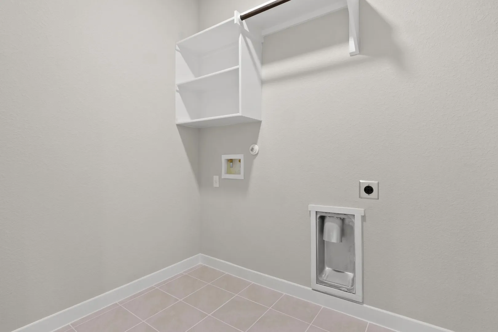 Utility room in the Willow home plan by Trophy Signature Homes – REPRESENTATIVE PHOTO