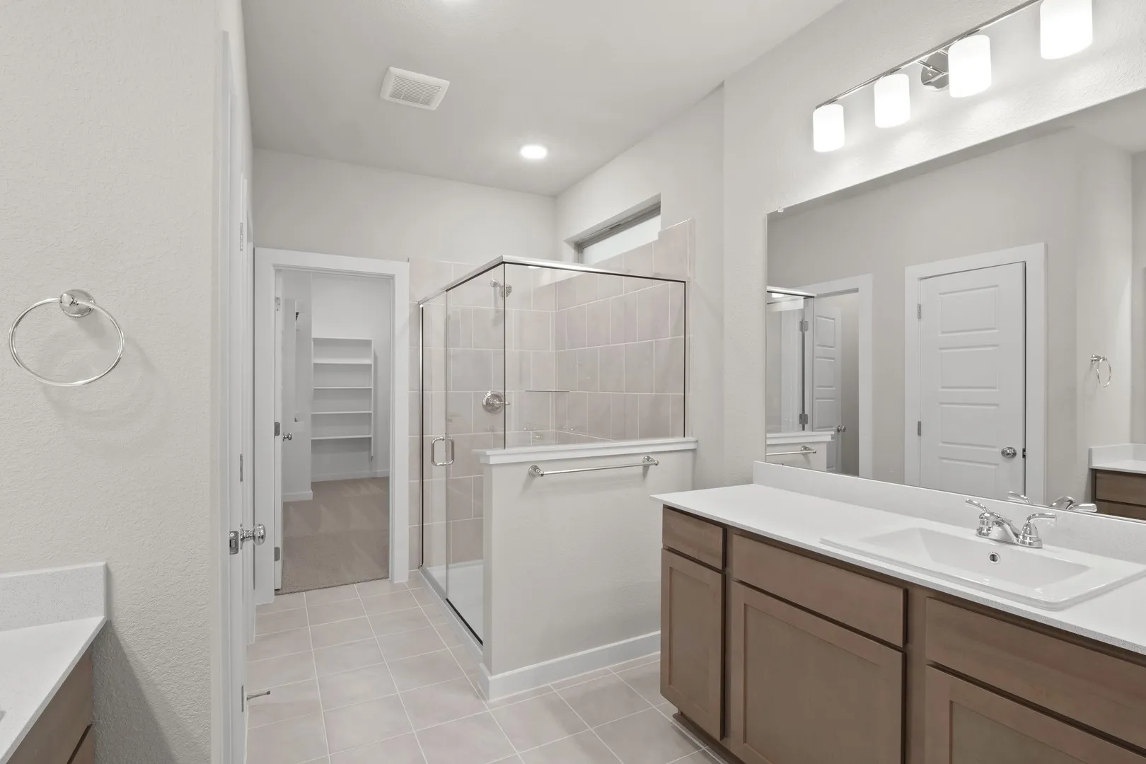 Primary Bathroom in the Willow home plan by Trophy Signature Homes – REPRESENTATIVE PHOTO