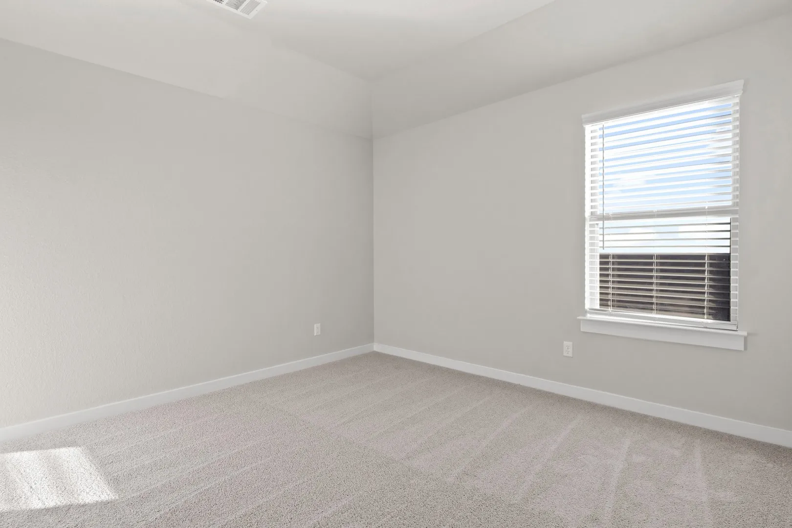Bedroom in the Willow home plan by Trophy Signature Homes – REPRESENTATIVE PHOTO