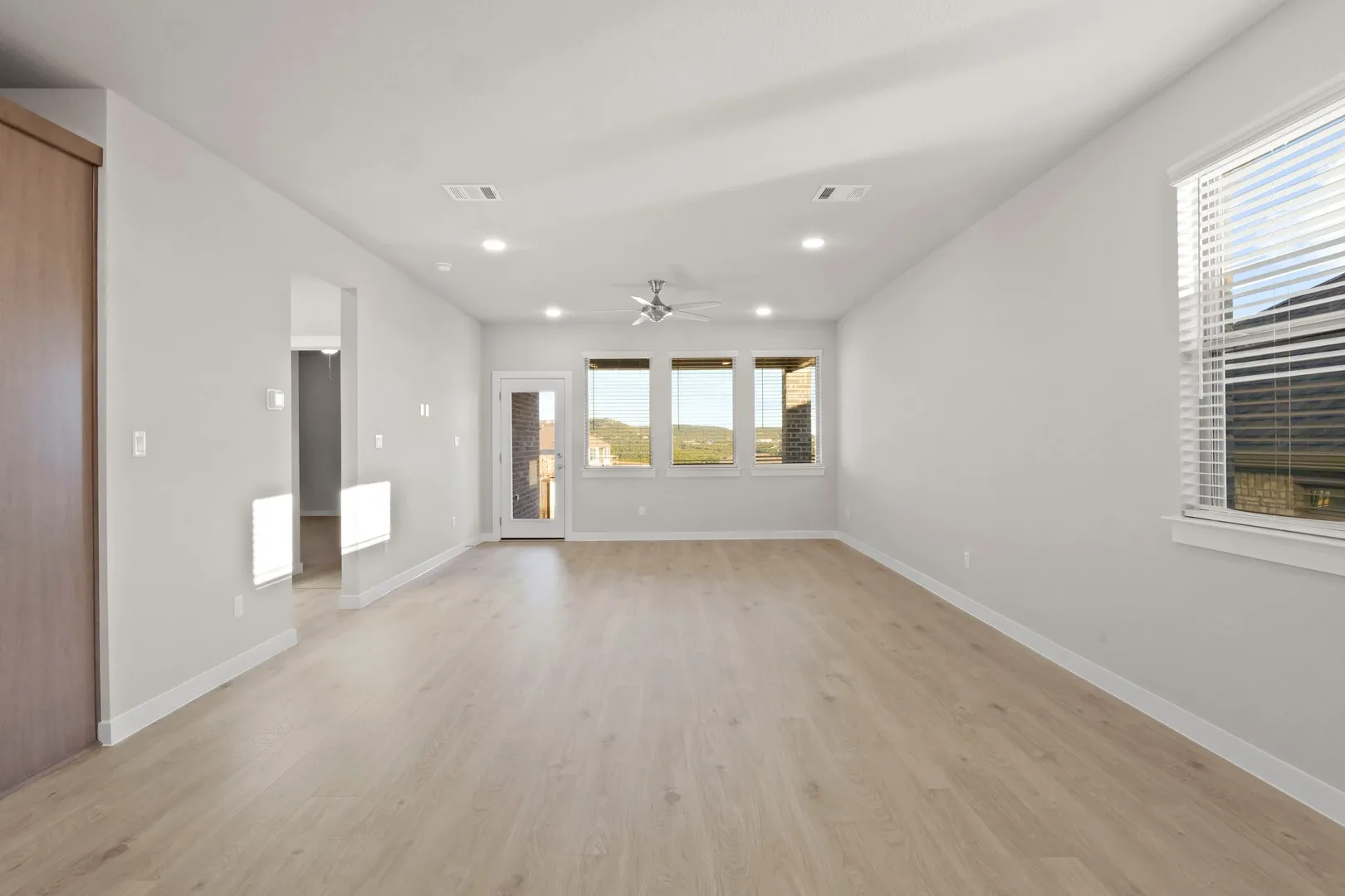 Living Room in the Willow home plan by Trophy Signature Homes – REPRESENTATIVE PHOTO