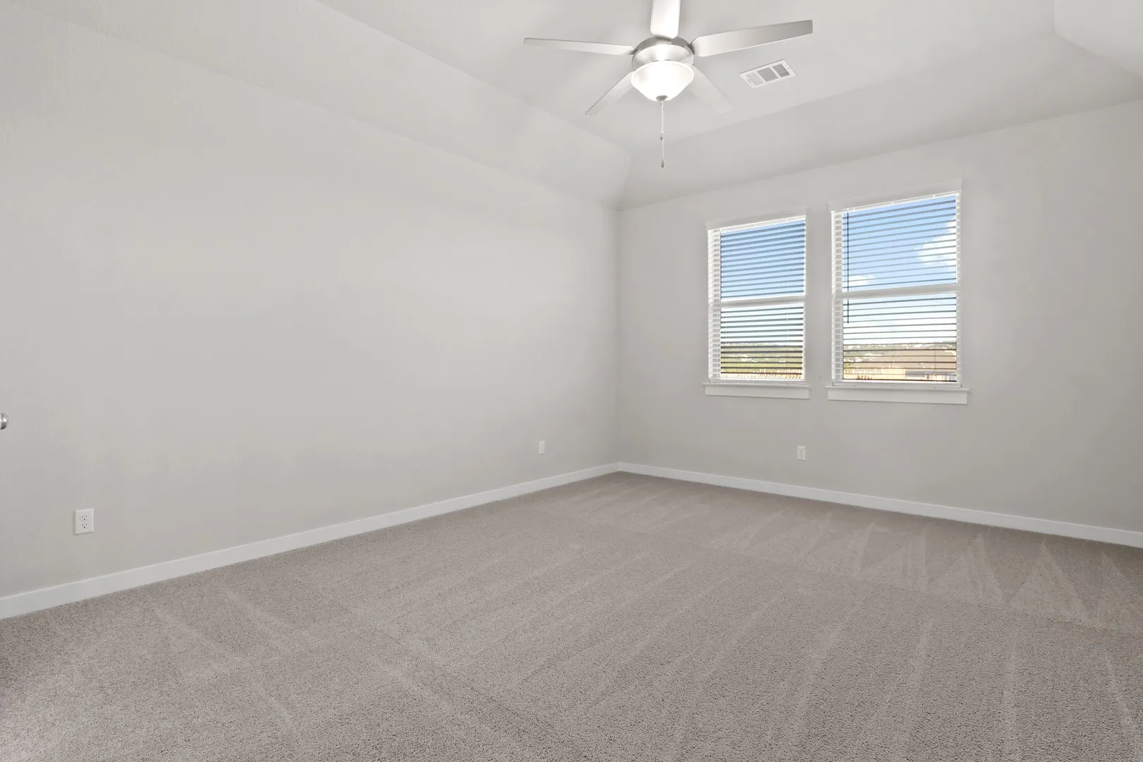 Primary suite in the Willow home plan by Trophy Signature Homes – REPRESENTATIVE PHOTO