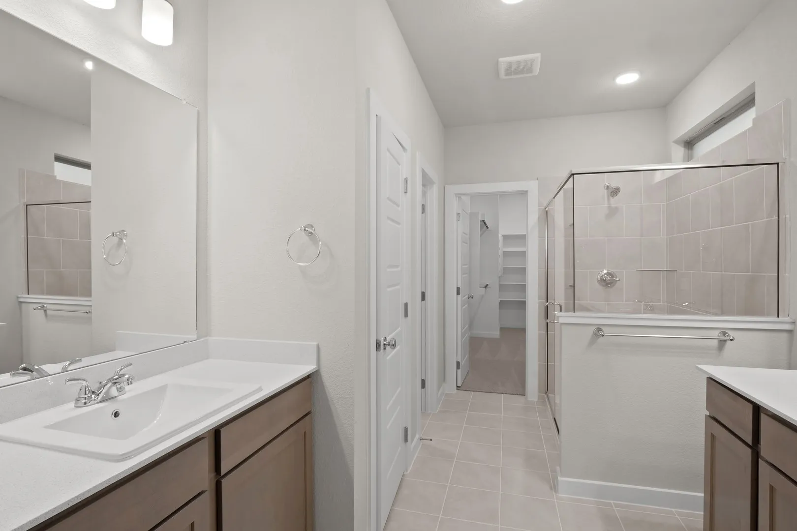 Primary Bathroom in the Willow home plan by Trophy Signature Homes – REPRESENTATIVE PHOTO