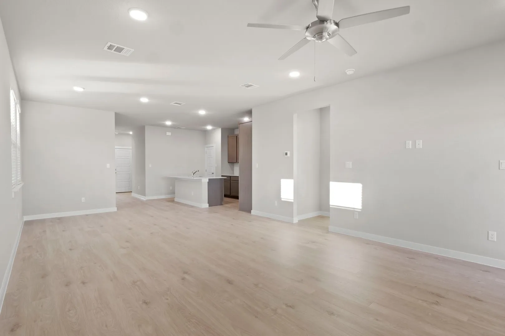 Living Room in the Willow home plan by Trophy Signature Homes – REPRESENTATIVE PHOTO