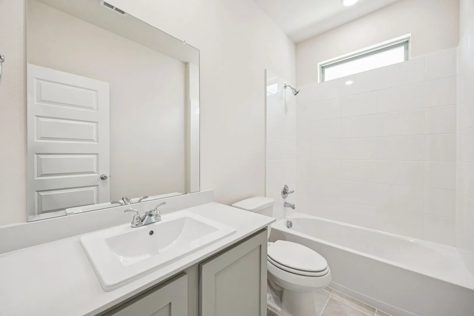 Bathroom in the Claret home plan by Trophy Signature Homes – REPRESENTATIVE PHOTO