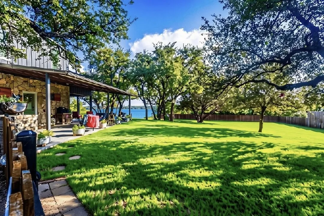 Large Oak Tree Shaded Yard with Lake Views from the Yard and Covered Patios and Screened in Porch