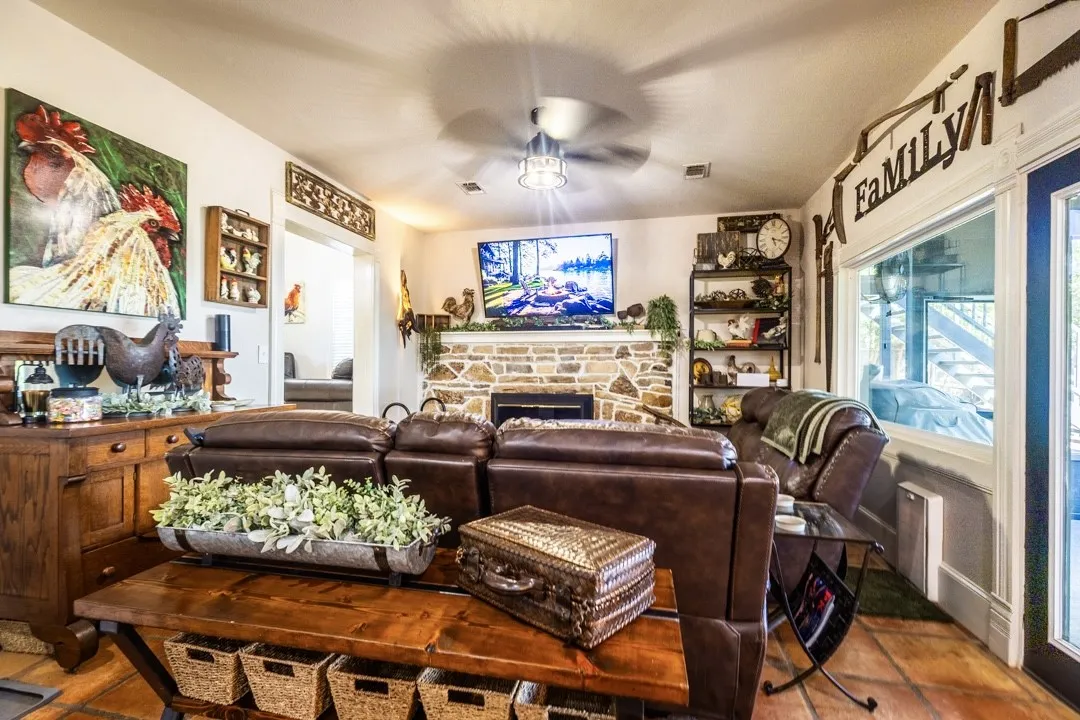 Access to the Sun Room and Covered Porches from the Living Room and Kitchen