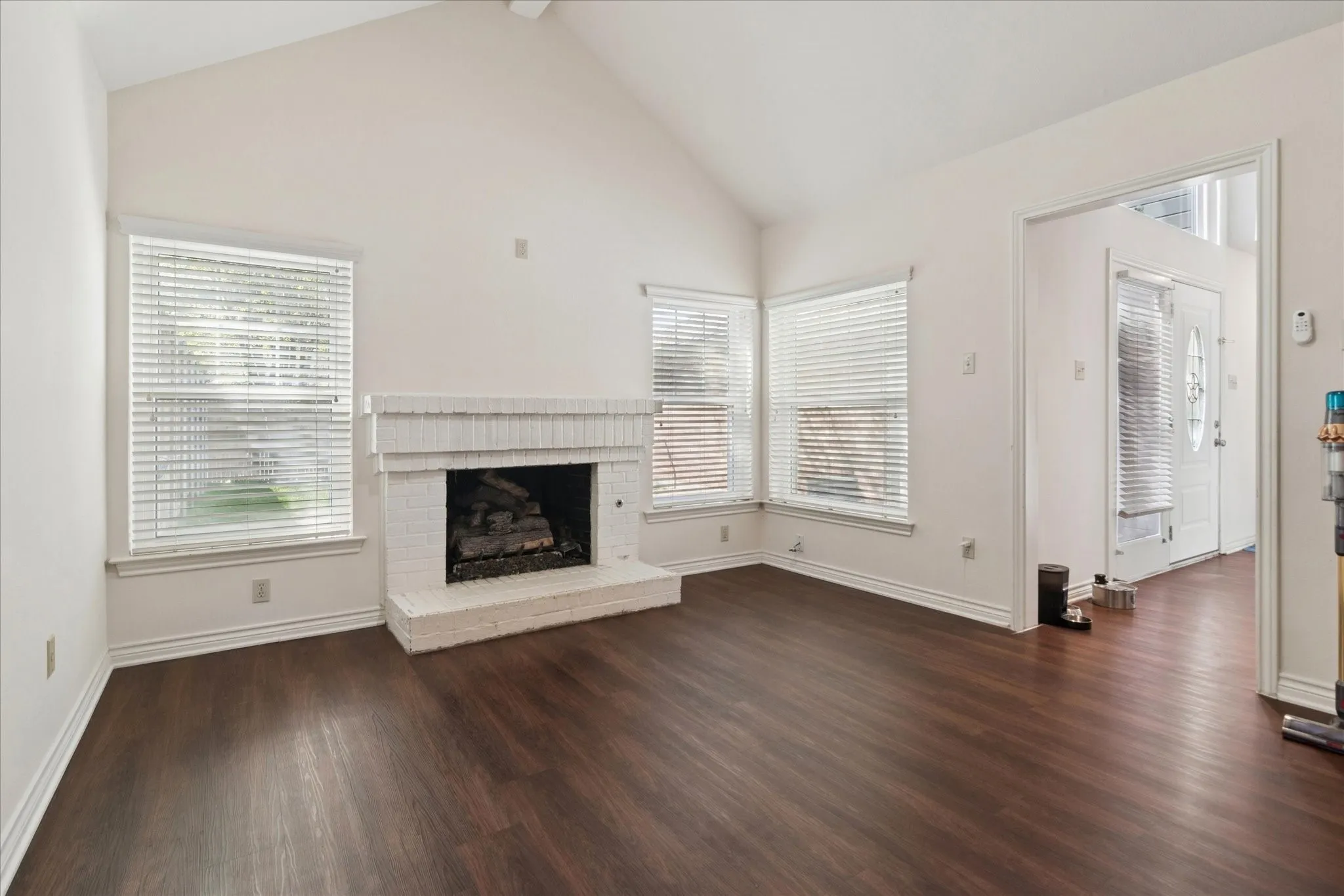 Family Room overlooks rear yard and opens onto the Great Room