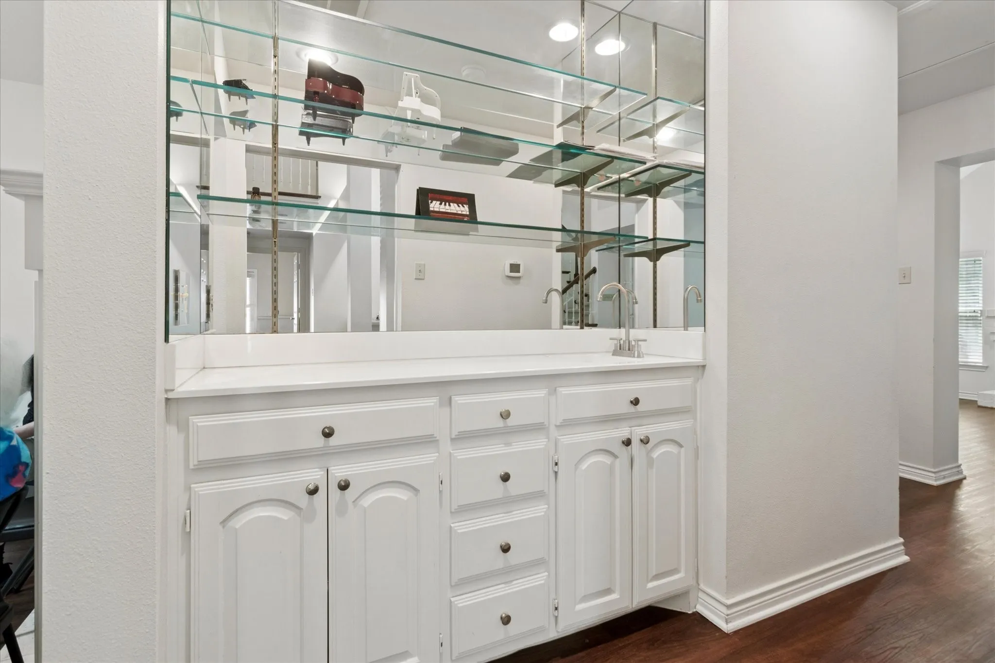 Large wet bar opens onto Great Room for easy entertaining