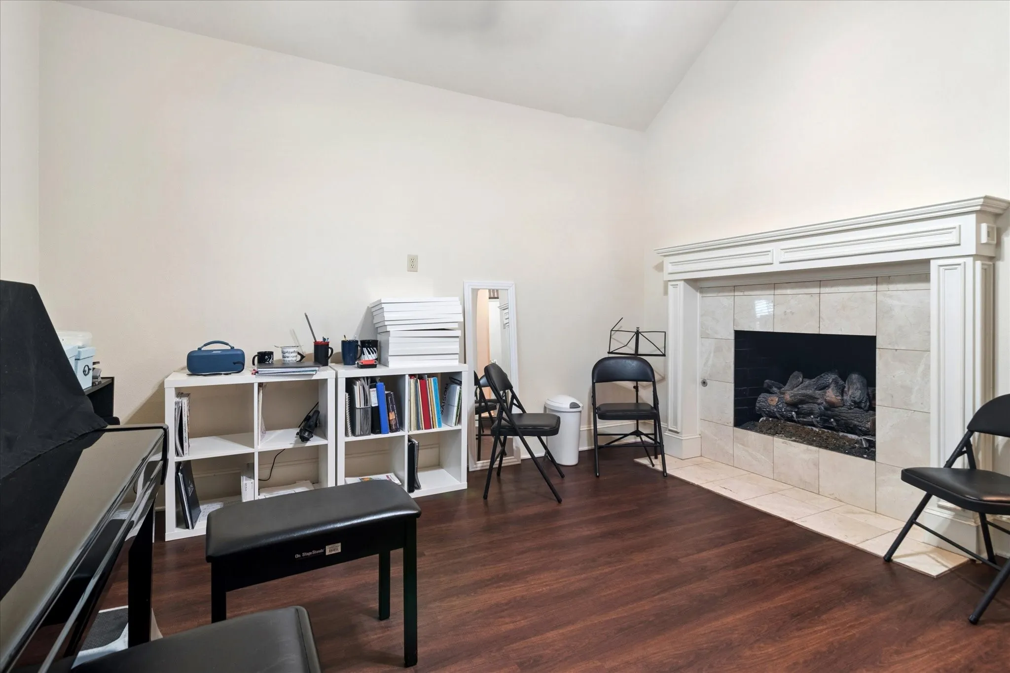 Near front entry is office - currently used as a music studio - with a gas-log fireplace.