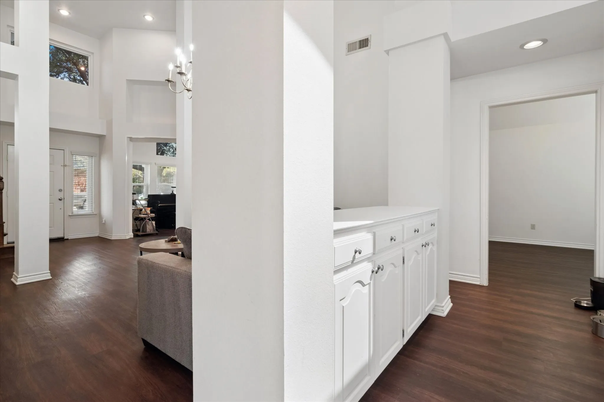 Built-in cabinets and serving bar along rear of Great Room