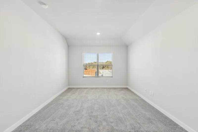 Media Room in the Winters home plan by Trophy Signature Homes – REPRESENTATIVE PHOTO