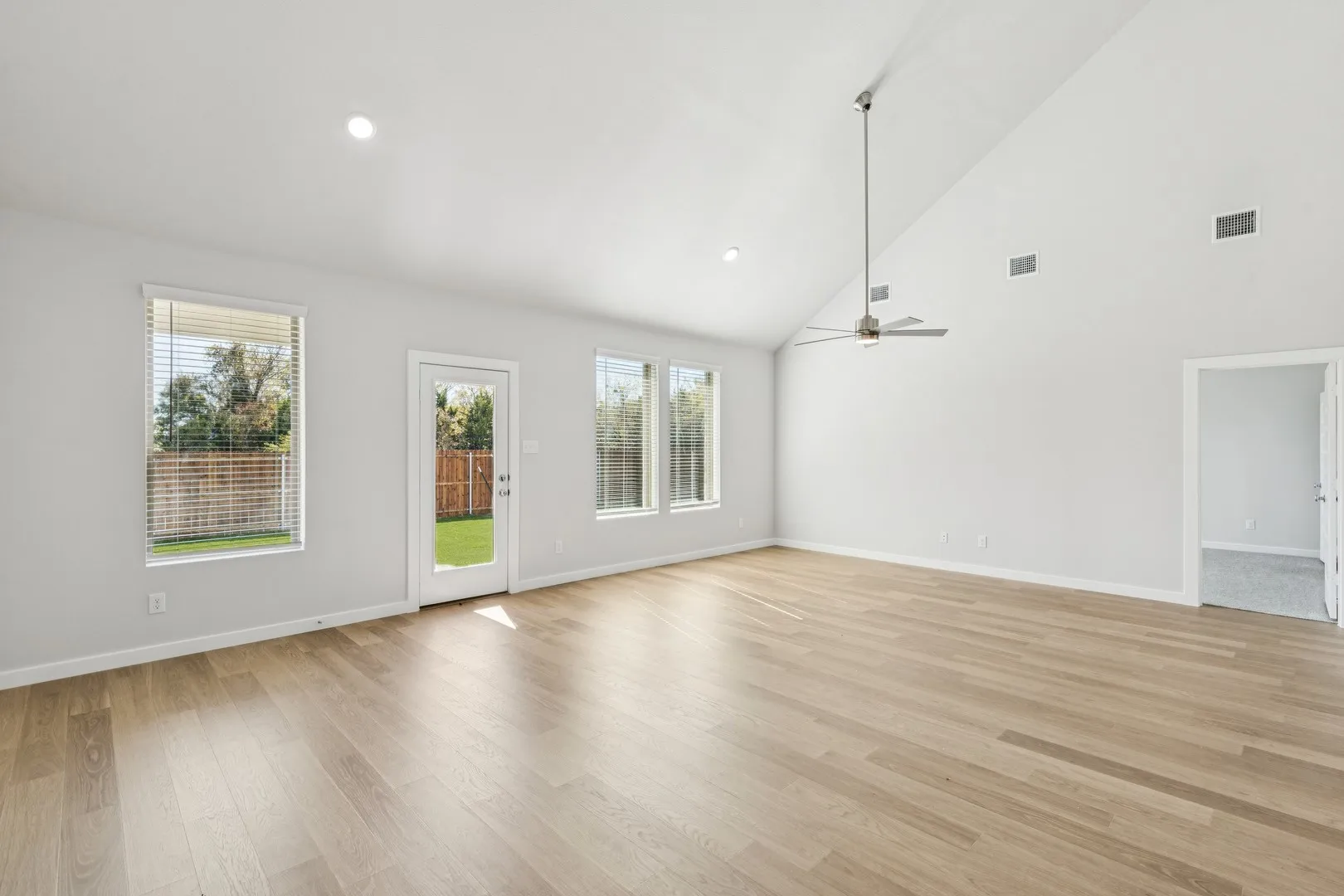 Living and Dining Rooms in the Winters home plan by Trophy Signature Homes – REPRESENTATIVE PHOTO