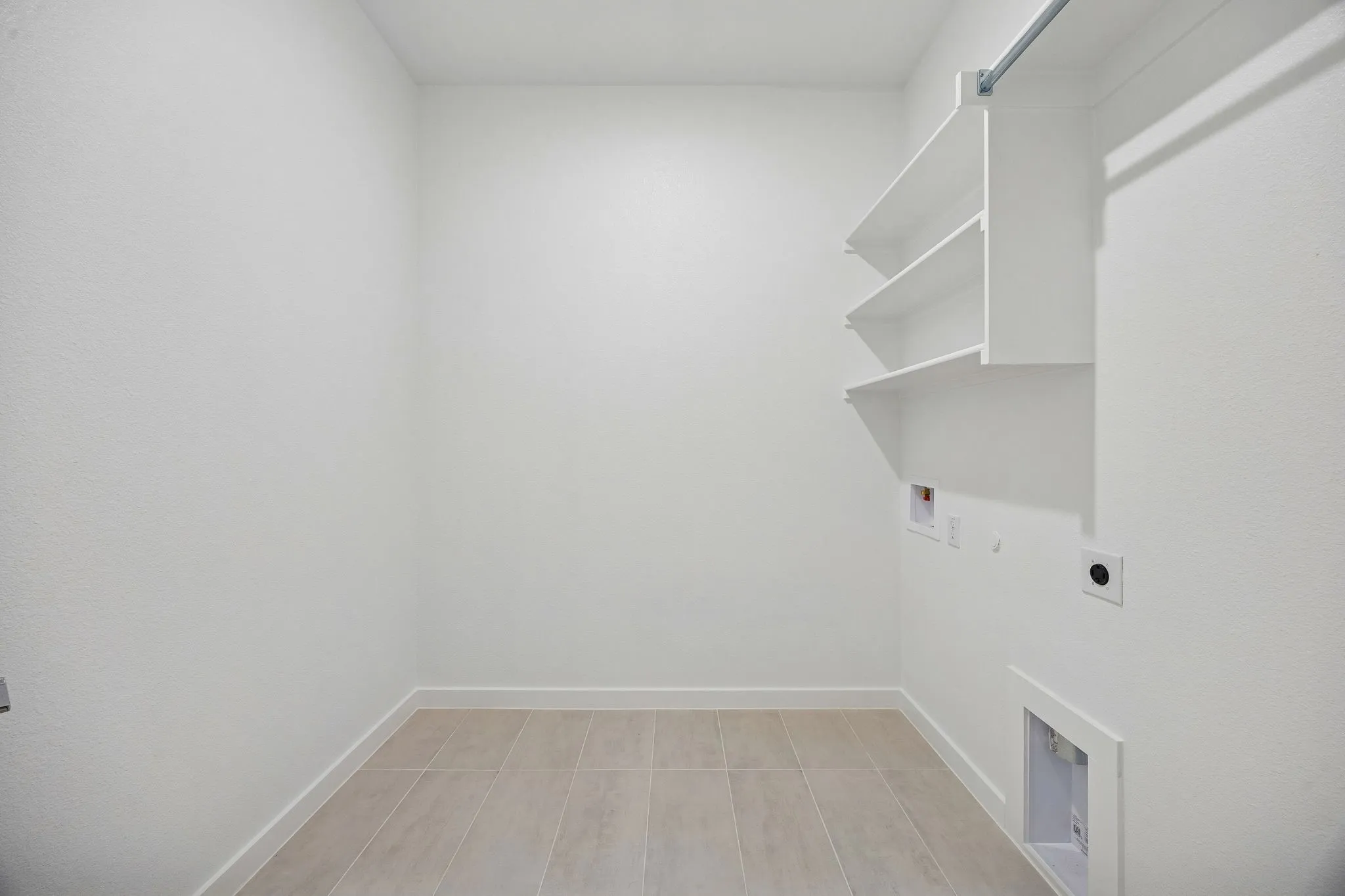 Utility Room in the Gilmour II home plan by Trophy Signature Homes – REPRESENTATIVE PHOTO