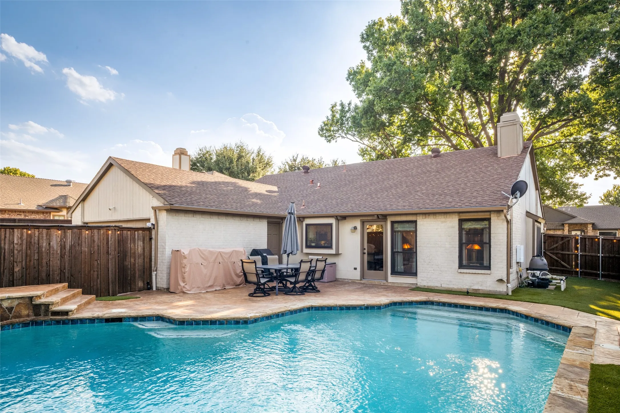 Low maintenace backyard!  The pool was resurfaced two years ago.  The pool filter & pump were replaced in 2025. The entire backyard is synthetic turf!