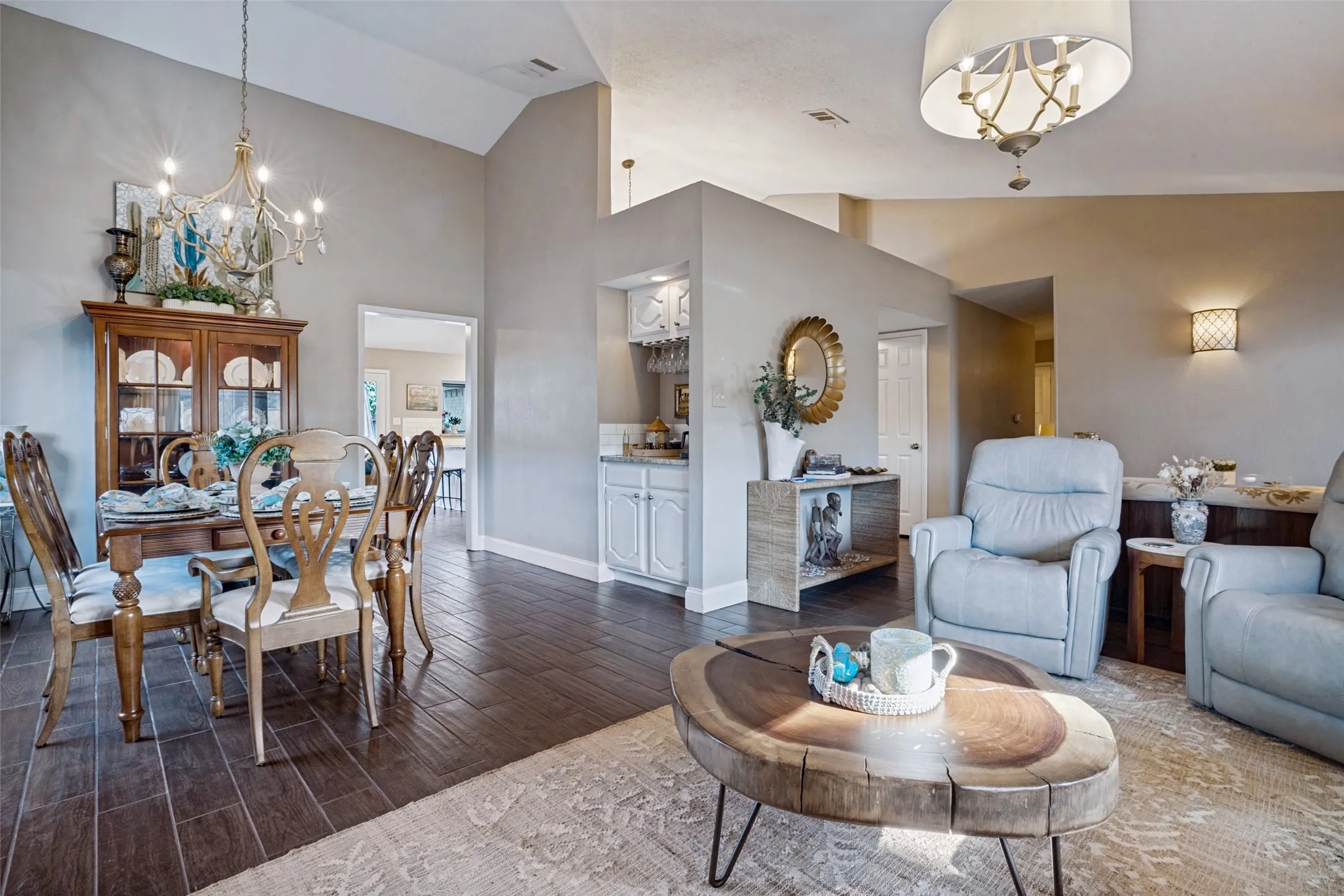 The flow between the dining and living areas creates the perfect entertaining space, ideal for both everyday living and hosting gatherings.