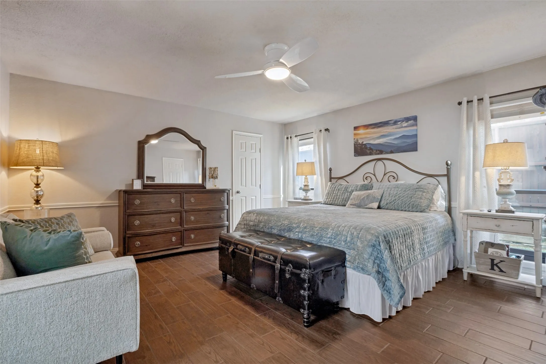 The primary bedroom is large enough to accommodate a lot of furniture!