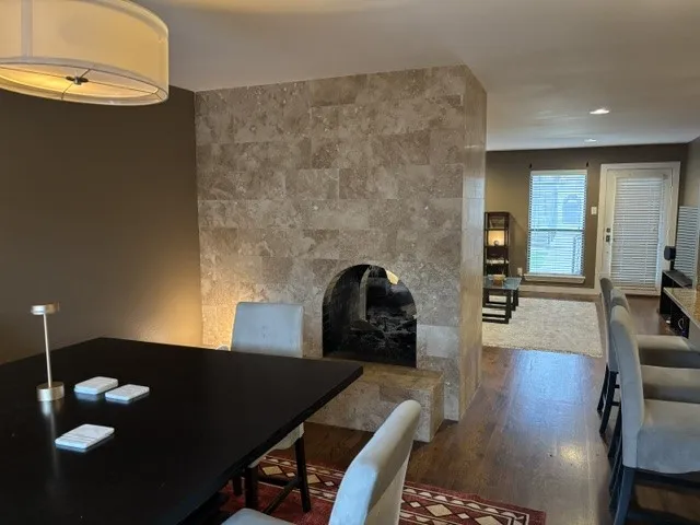 See through fireplace with gas logs